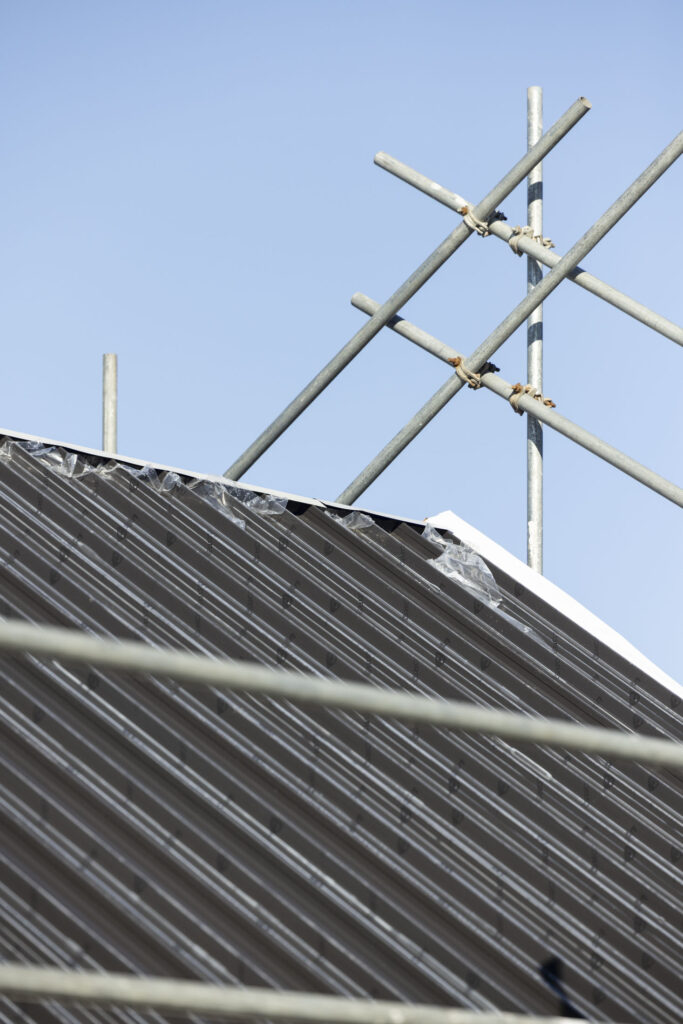 roofing progress - iron and scaffolding setup